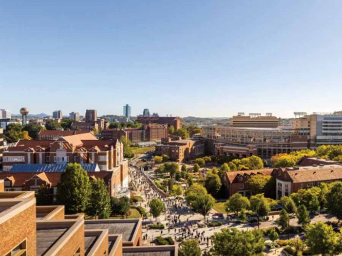 A hero shot of campus, from the top of Hodges Library, showing Downtown Knoxville and campus which includes Haslam College of Business, Ayres Hall, Neyland Stadium, Claxton Education Building, Hesler Biology Building, Alumni Memorial Building, photo from UT Campus News