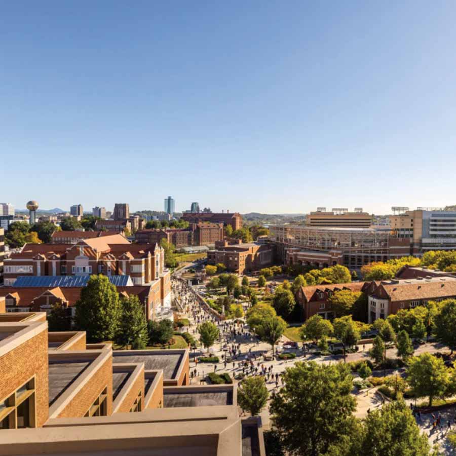 A hero shot of campus, from the top of Hodges Library, showing Downtown Knoxville and campus which includes Haslam College of Business, Ayres Hall, Neyland Stadium, Claxton Education Building, Hesler Biology Building, Alumni Memorial Building, photo from UT Campus News