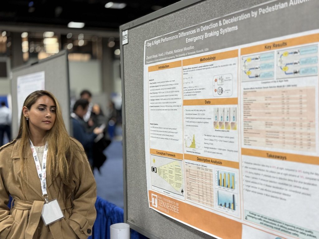 Nastaran Moradloo posing in front of her research project poster at the 2025 TRB conference