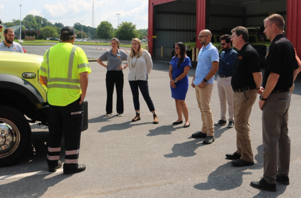 CTR researchers gather around a TDOT rescue truck in a networking meeting/TDOT facility tour in 2025