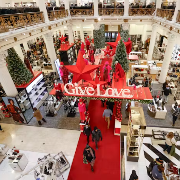 shoppers in a macys