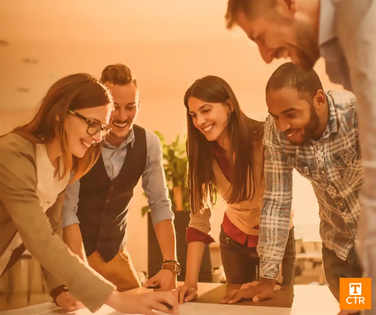 Group of people working together with an orange tint and a CTR logo