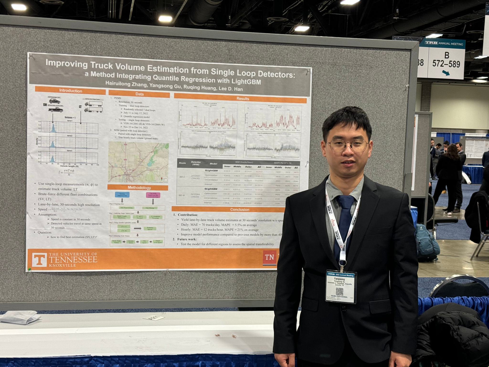 a student researcher posing in front of her research project poster at the 2025 TRB conference